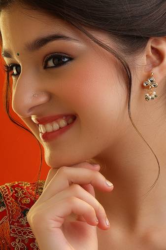 White stone green beaded kundan stud earrings