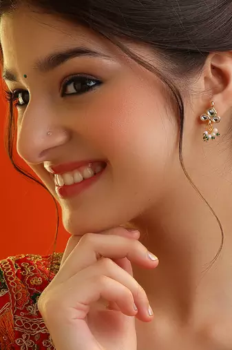 White stone green beaded kundan stud earrings