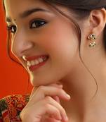 White stone green beaded kundan stud earrings