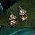 White stone green beaded kundan stud earrings