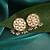 White stone green beaded kundan stud earrings