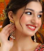 White stones green beaded kundan drop earrings