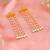 White stones green beaded kundan drop earrings