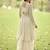 Off white net embroidered readymade palazzo suit with jacket