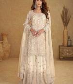 Cream embroidered net readymade sharara suit