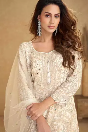 Cream embroidered net readymade sharara suit
