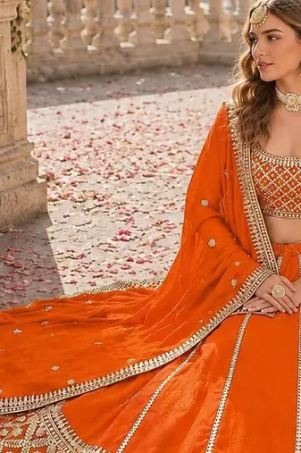 Orange embriodered art silk semi stitched Lehenga choli