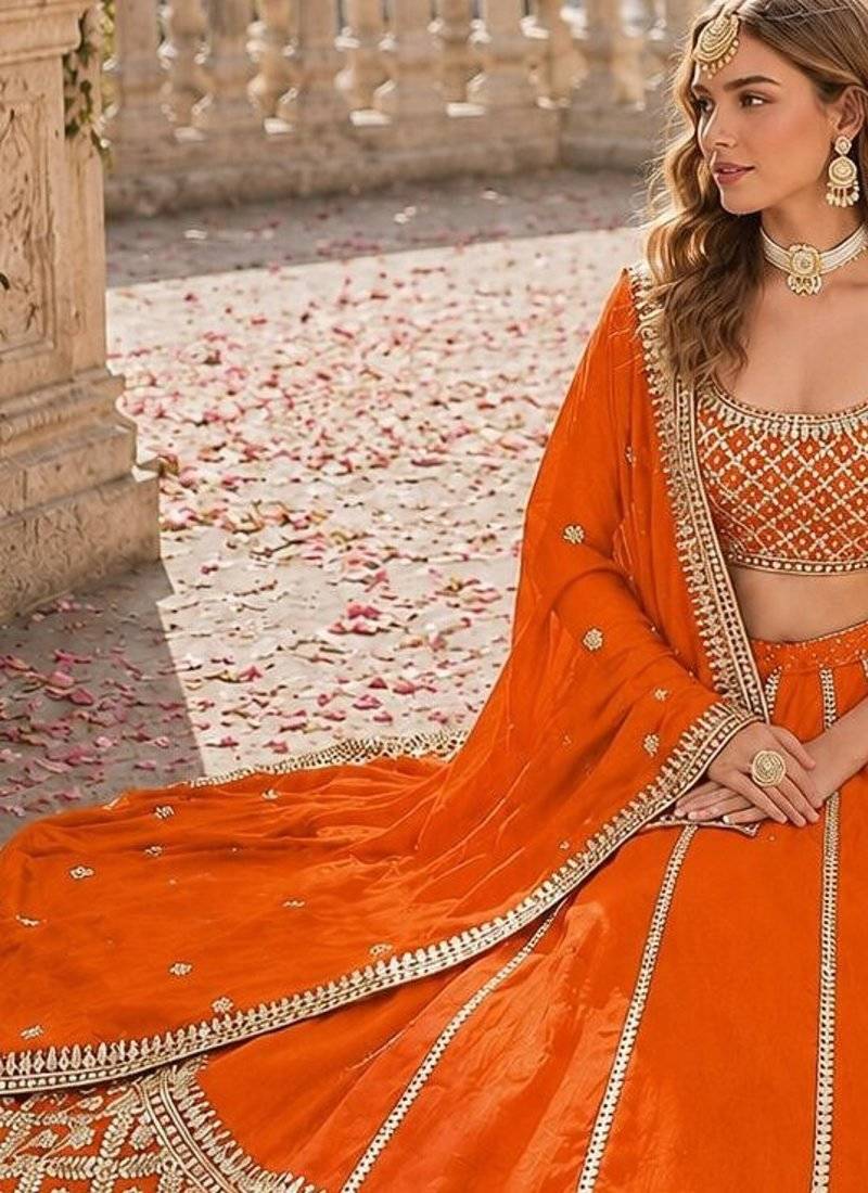 Orange embriodered art silk semi stitched Lehenga choli