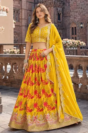 Yellow art silk semi stitched lehenga choli with taby silk print