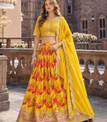 Yellow art silk semi stitched lehenga choli with taby silk print