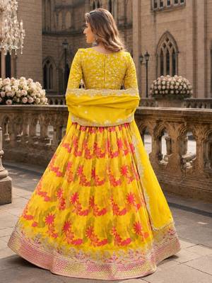 Yellow art silk semi stitched lehenga choli with taby silk print 2