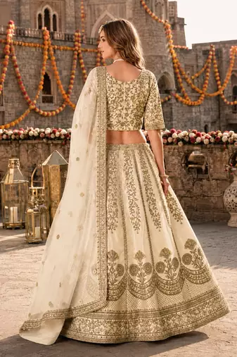 White Art Silk Semi Stitched Lehenga Choli with Heavy Embroidery Work