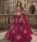 Magenta heavy art silk semi stitched lehenga choli with embroidery work