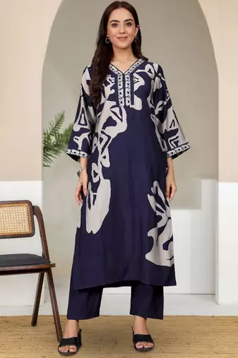 Women Abstract Printed V Neck Flared Sleeve Kurta with Trouser