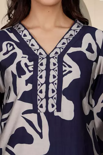Women Abstract Printed V Neck Flared Sleeve Kurta with Trouser