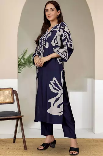 Women Abstract Printed V Neck Flared Sleeve Kurta with Trouser