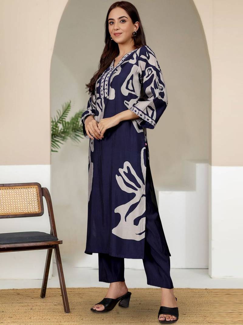 Women Abstract Printed V Neck Flared Sleeve Kurta with Trouser