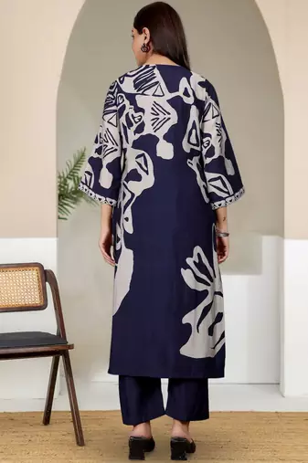 Women Abstract Printed V Neck Flared Sleeve Kurta with Trouser