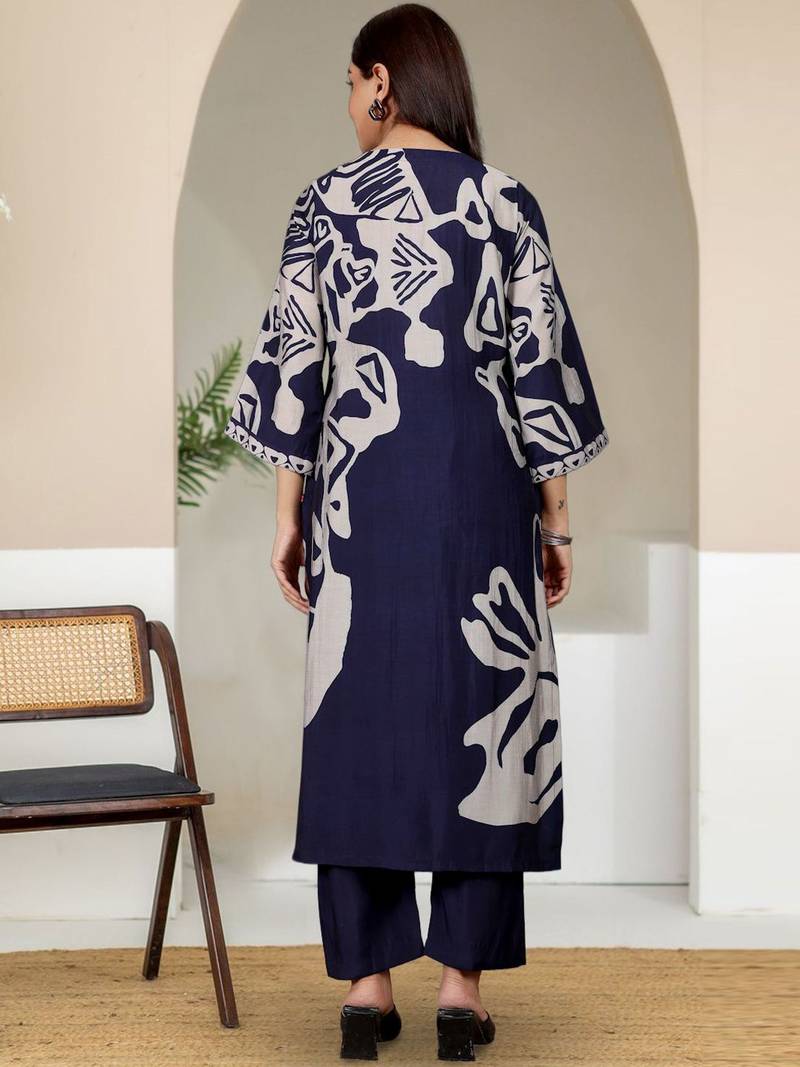 Women Abstract Printed V Neck Flared Sleeve Kurta with Trouser