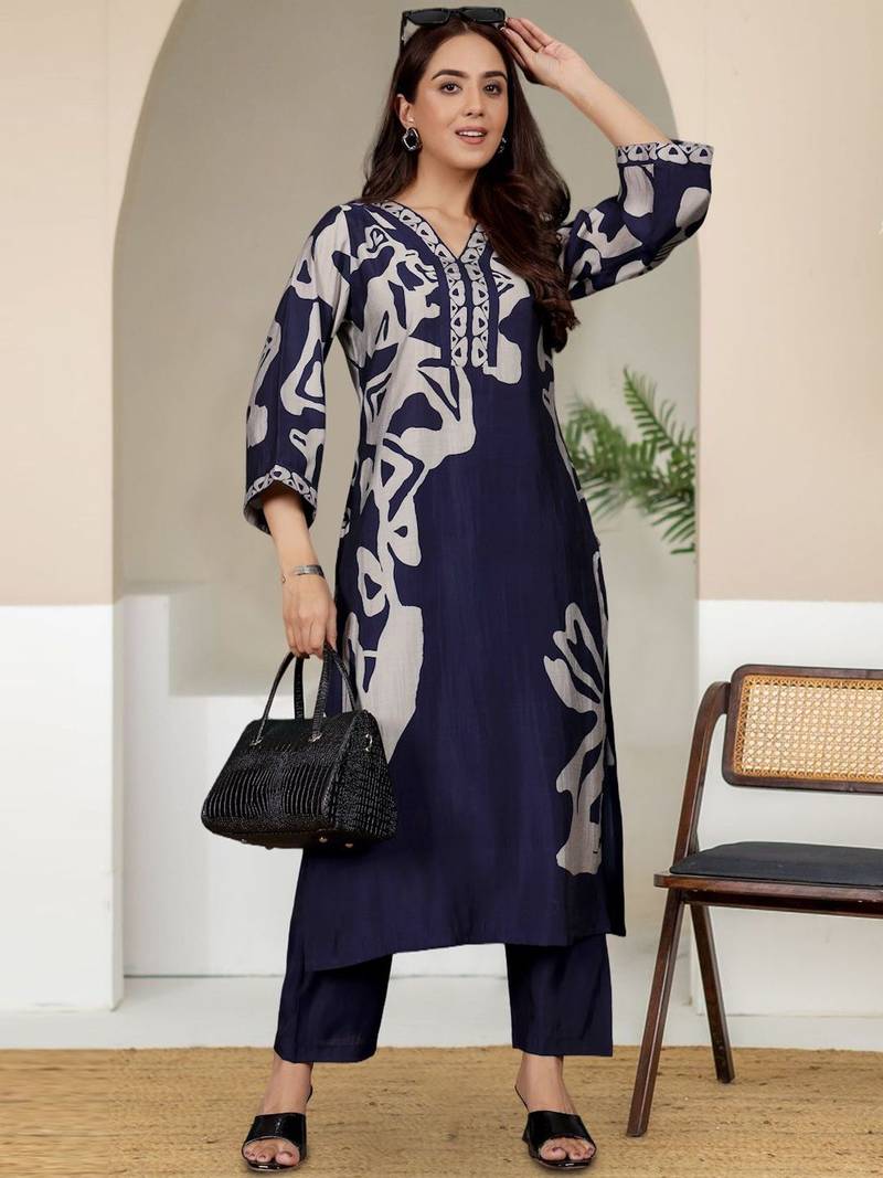 Women Abstract Printed V Neck Flared Sleeve Kurta with Trouser