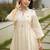 Women Pleated Thread Work Kurta with Trousers