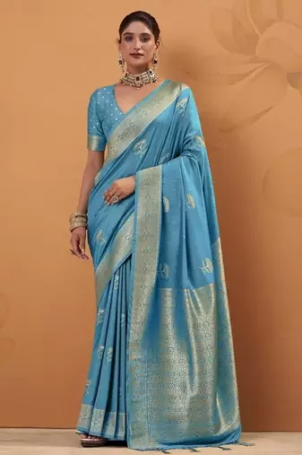 Sky blue tussar silk saree with rich zari border saree