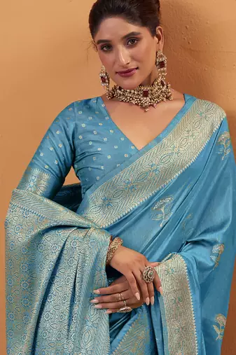 Sky blue tussar silk saree with rich zari border saree
