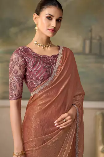 Gold luxurious party wear saree