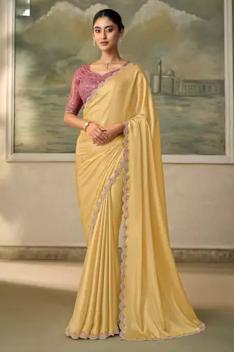 Yellow luxurious party wear saree