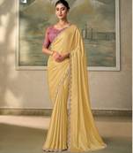 Yellow luxurious party wear saree