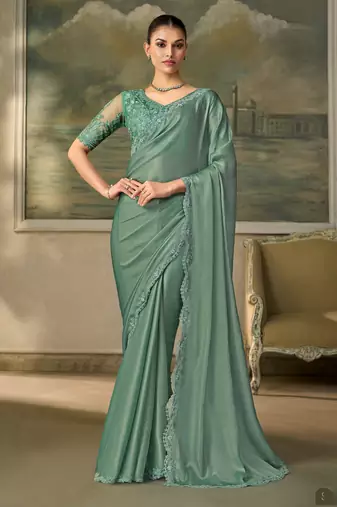 Green luxurious party wear saree