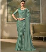 Green luxurious party wear saree