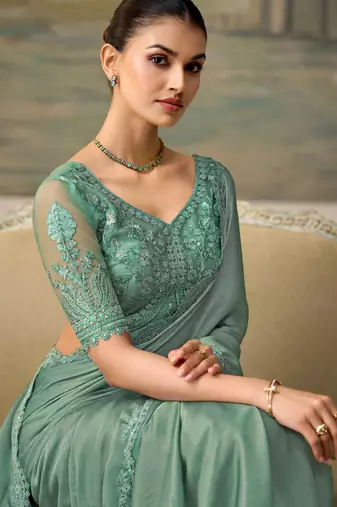 Green luxurious party wear saree