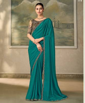 Teal luxurious party wear saree 1