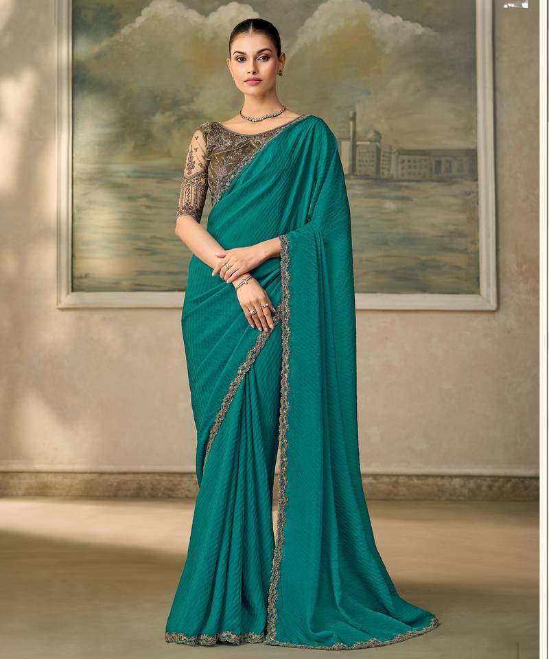 Teal luxurious party wear saree
