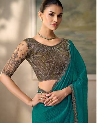 Teal luxurious party wear saree 2
