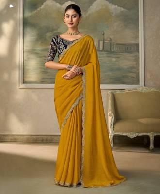 Yellow luxurious party wear saree 1