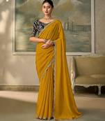 Yellow luxurious party wear saree