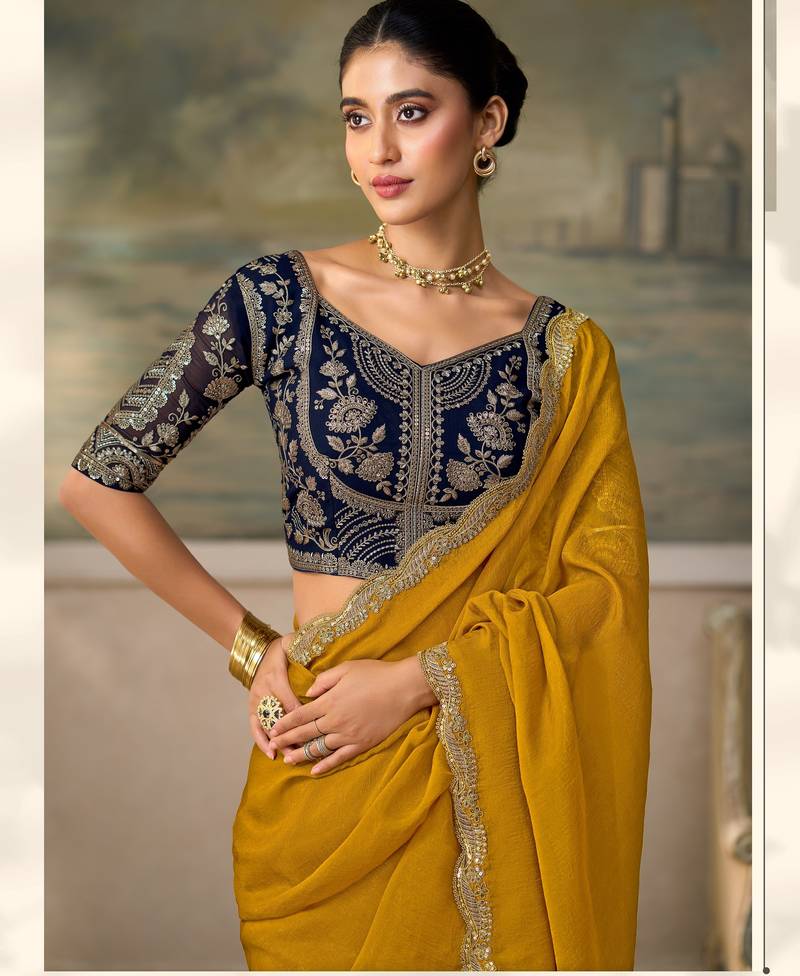 Yellow luxurious party wear saree