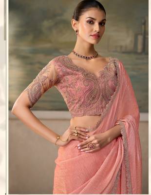 Peach luxurious party wear saree 2