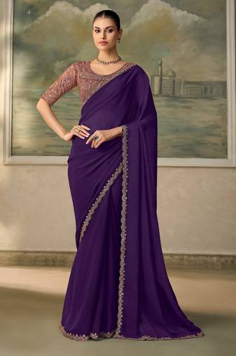 Purple luxurious party wear saree