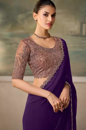 Purple luxurious party wear saree