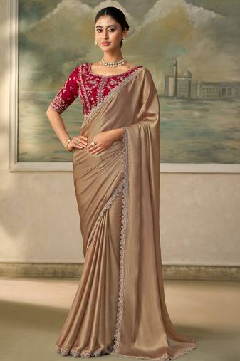 Golden luxurious party wear saree