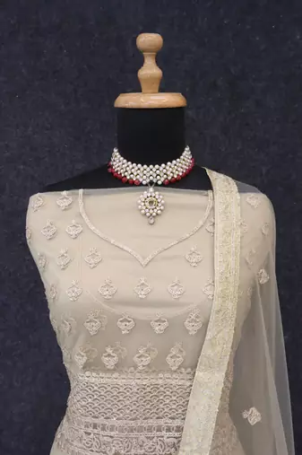 Beige embroidered net semi-stitched anarkali suit