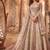 Rose gold embroidered net semi-stitched anarkali suit