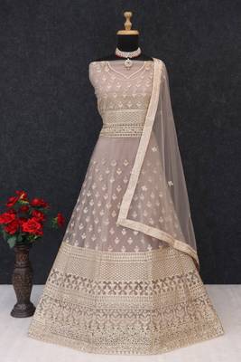 Rose gold embroidered net semi-stitched anarkali suit 2