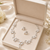 Pearl & cz floral necklace & earrings jewellery set silver-tone finish, bridal wear, cluster pearl design.