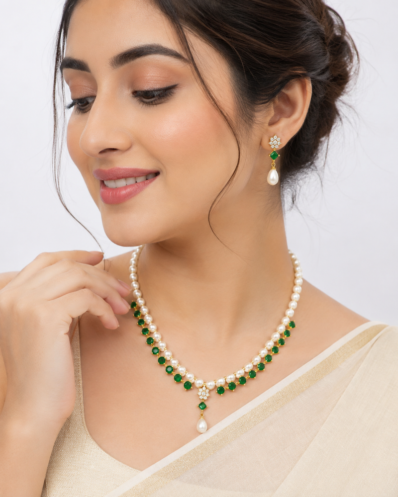 Pearl & emerald green stone necklace & earrings jewellery set gold-tone finish, teardrop pendant, cz stone accents.