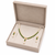 Pearl & emerald green stone necklace & earrings jewellery set gold-tone finish, teardrop pendant, cz stone accents.