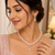 Pearl & pink stone necklace & earrings jewellery set pearl str&, drop earrings, cz centre stone, gold-tone setting.